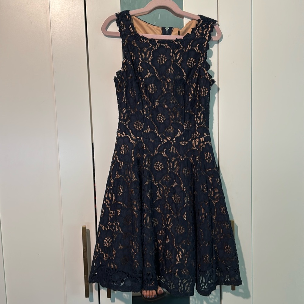 Blue lace sleevelesa dress with cream lining size 10/12